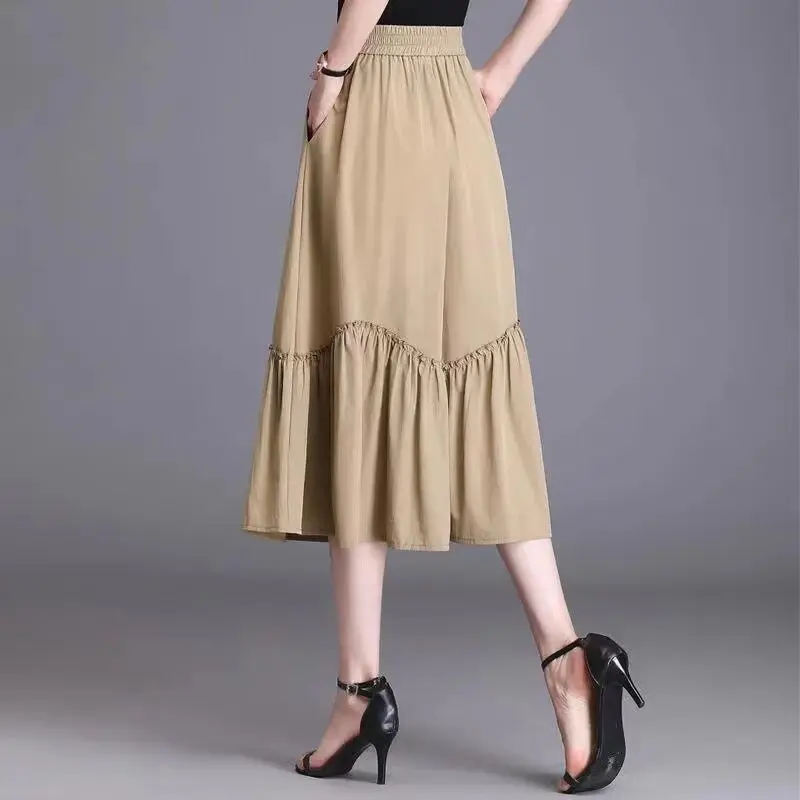 Fashion Solid Color Elastic Waist Pockets Spliced Ruffles Skirts Women Clothing 2024 Spring Summer Loose Casual High Waist Skirt