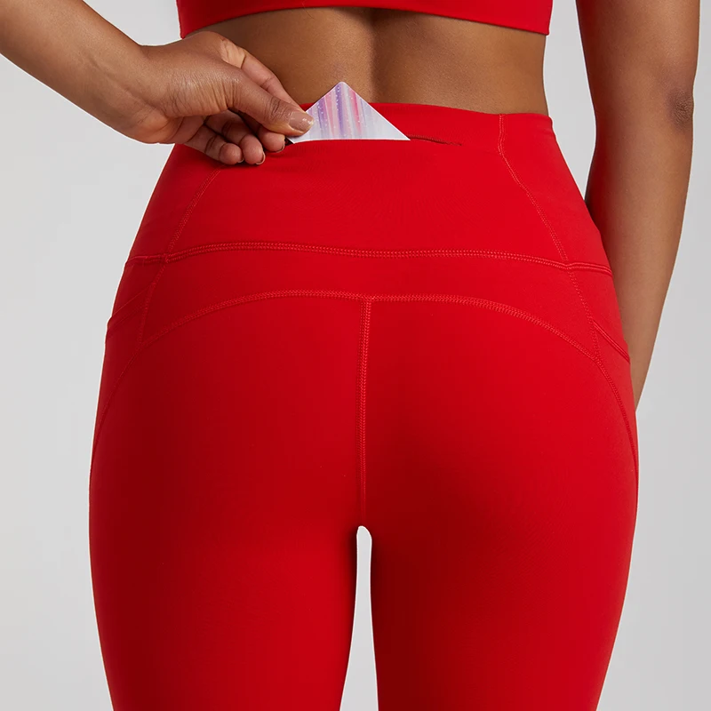 Legginsy nago czujące dla kobiet z kieszeniami bez przedniego szwu sterujące obcisłe treningi sportowe do biegania z wysokim stanem spodnie do jogi