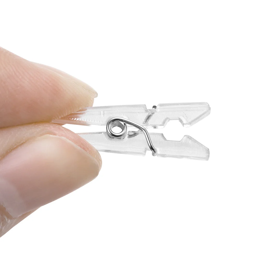 

100Pcs Premium Mini Clothespins Spring Hanging Clamps for Photo Paper Chip Bags Clothing Hanging Lightweight Portable Clothes