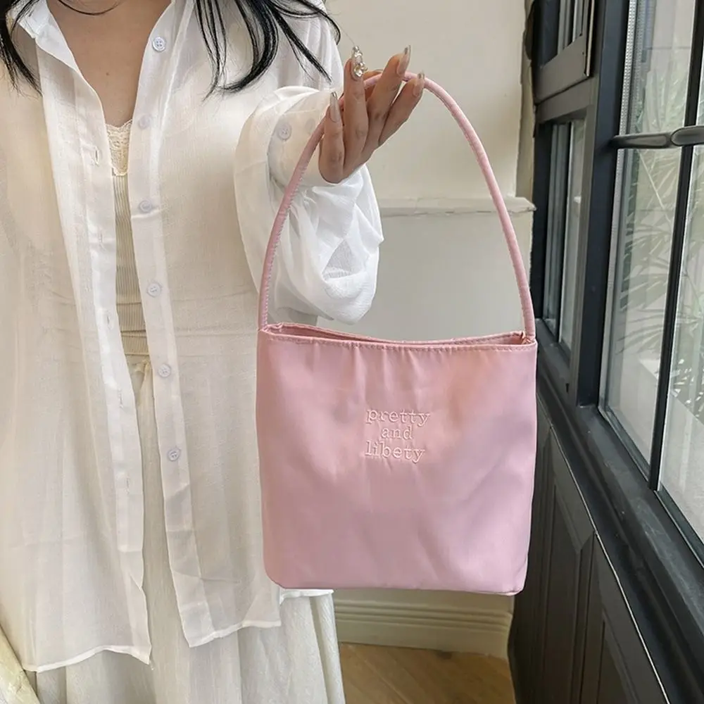 

Korean Style Letter Underarm Bag Tote Bag Pure Color Embroidery Shoulder Bag Large Capacity Handbag Nylon Bucket Bag Women