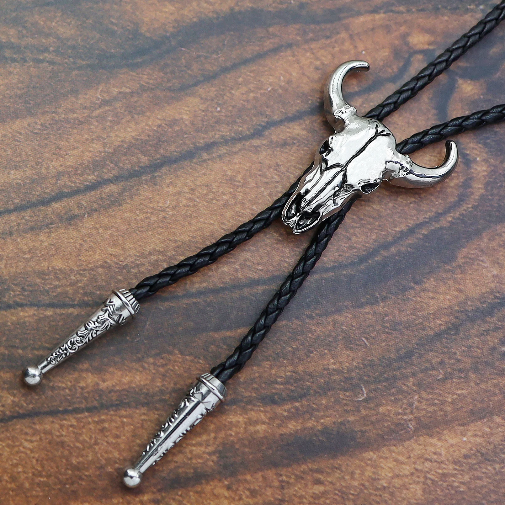 Western Vintage Bolo Tie for Men Cow Skull Design Cowboy Tie Black Leather Rope Necktie Bull Head Pendant Necklace Jewelry Gifts