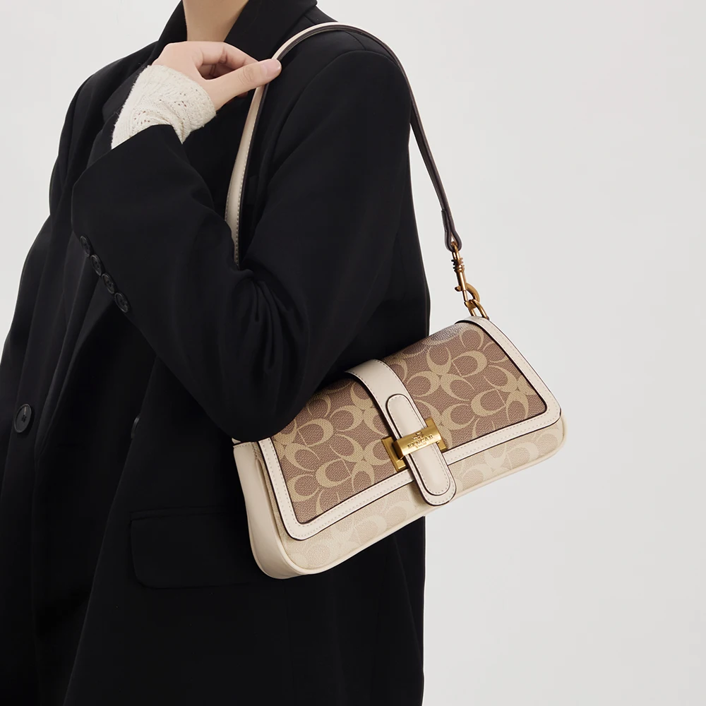 Women's handbag 2026 new fashionable niche design retro shoulder bag daily matching with high-end light luxury crossbody bag.
