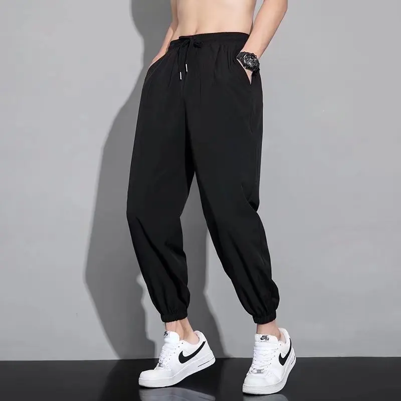 بنطلون رجالي صيفي رقيق من الحرير الجليدي سريع الجفاف فضفاض رياضي عصري غير رسمي طويل للأعمال بقصة مستقيمة تسعة أرباع الطول