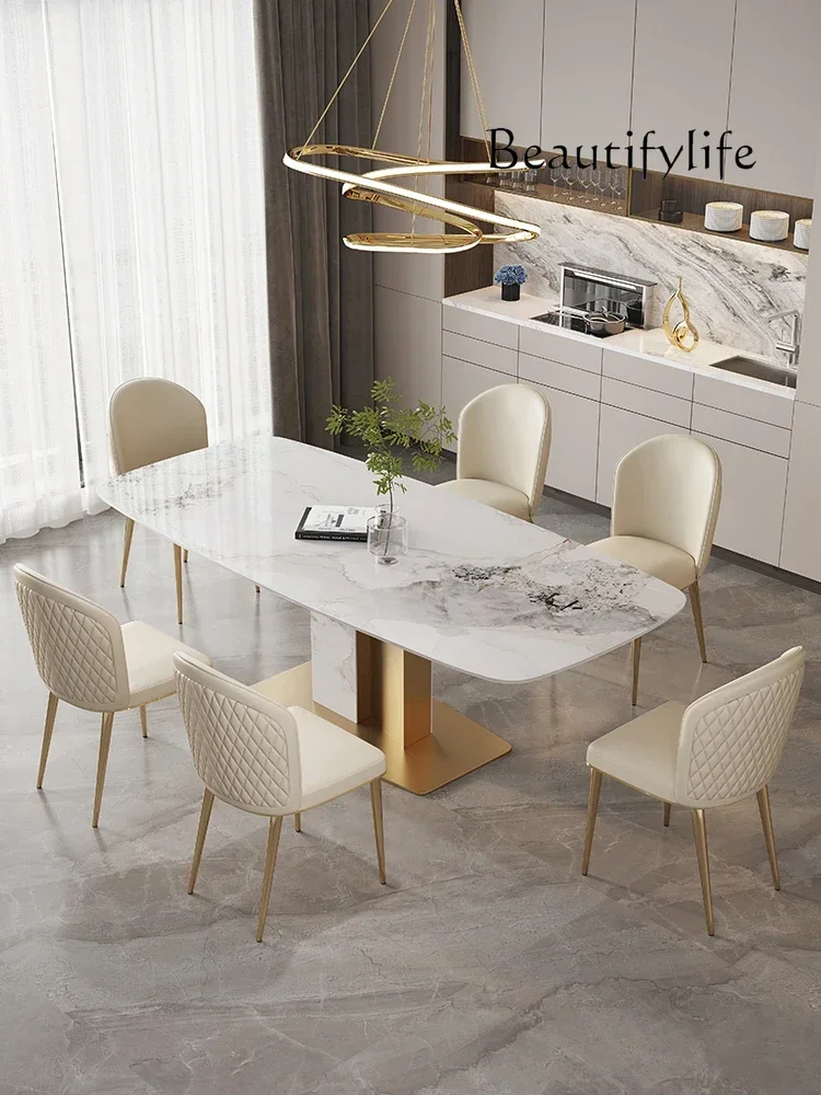 Italian bright rock slab dining table and chair combination light luxury designer high-end rectangular dining table