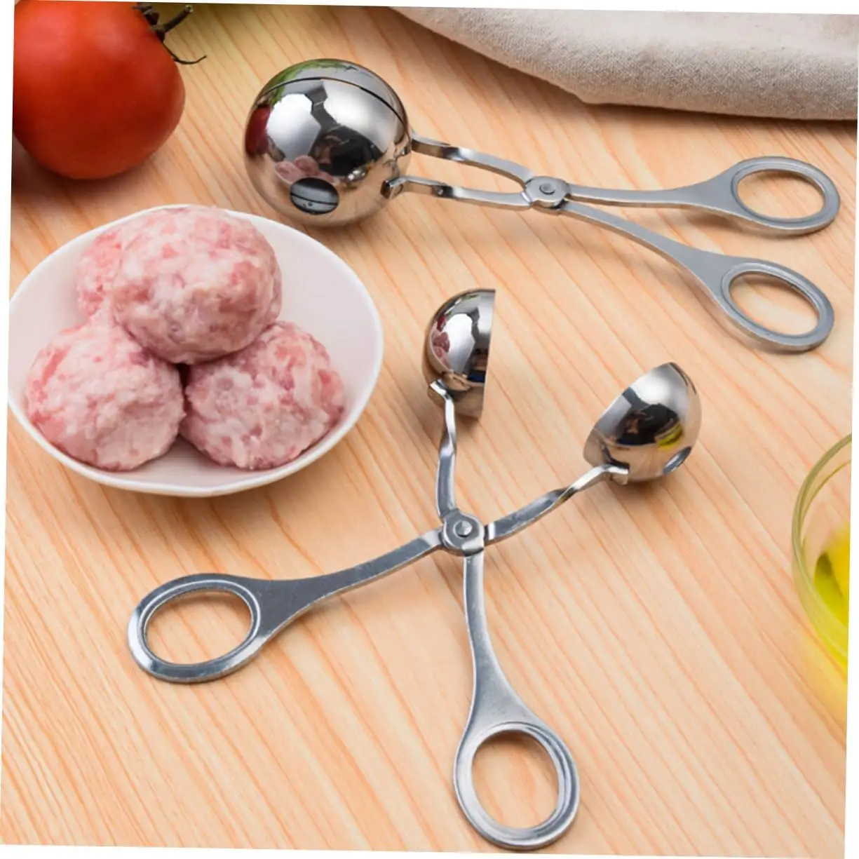 

2-Pc Stainless Steel Meatball Maker Set (Sizes: L & S): Versatile For Meat, Fruit & Rice Balls. Easy To Use And Clean.