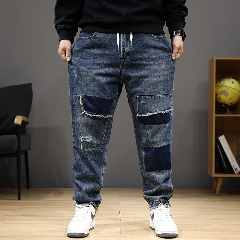 عداء ببطء الجينز الرجال الدنيم السراويل حجم كبير 8XL موضة المرقعة الجينز عادية مرونة الخصر الدنيم السراويل الذكور سراويل كبيرة الحجم