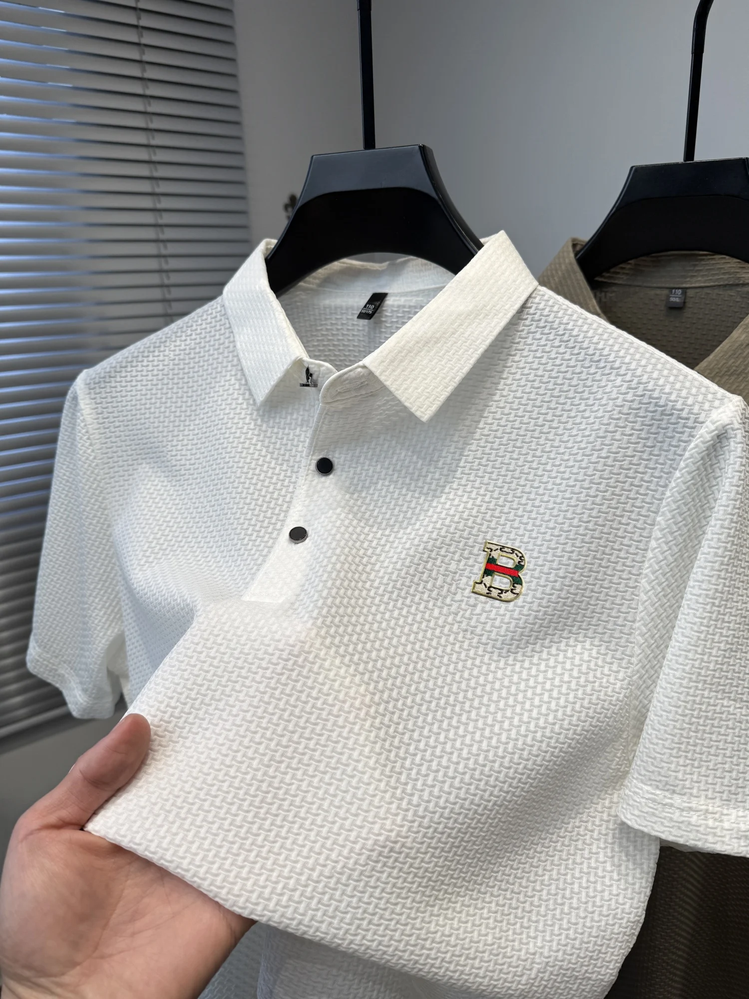 Summer new relief design short sleeved high-quality elastic breathable polo shirt fashionable men's business casual T-shirt top