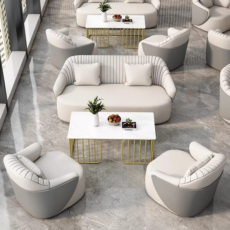 Nuevo vestíbulo de hotel, reuniones comerciales, sofá de cuero, asiento de tarjeta creativo de diseño, mesas de negociación para recepción de reuniones de negocios