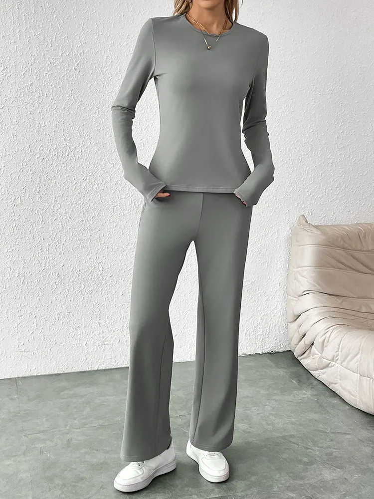 

Женский комплект: футболка и брюки. Новинка весны. Свободный крой, однотонный, модный, с длинными рукавами. Повседневный, элегантный, приталенный.