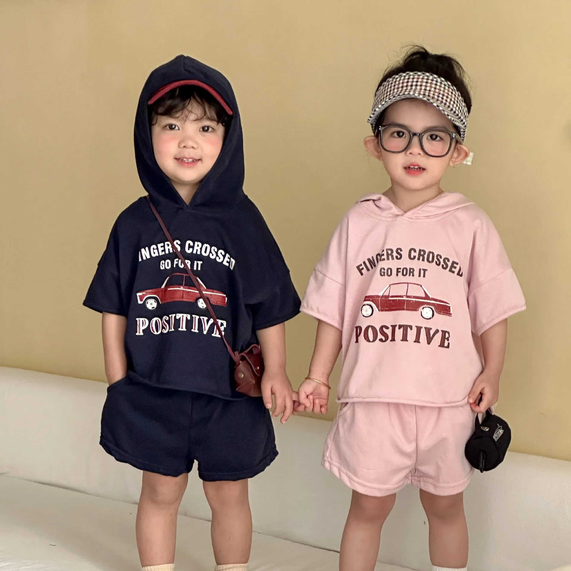 

2026 Summer New Children Loose Casual Sportswear Set Boys Girls Short Sleeve Hooded Tops + Shorts 2pcs Suit Toddler Outfits