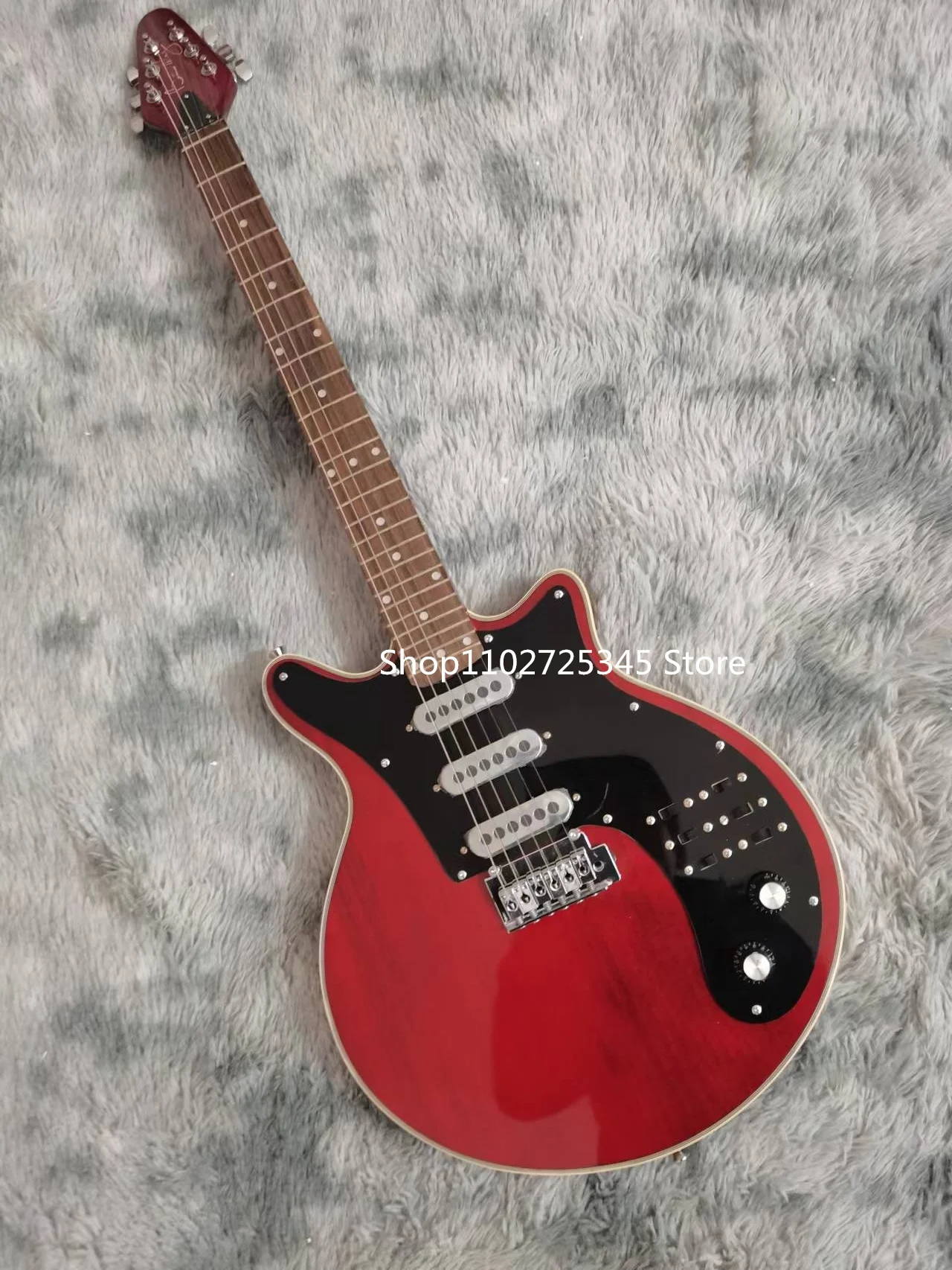 

Electric Guitar with Mahogany Fingerboard, Gold Accessories, Vibrato Bridge, the Seller, The Freight