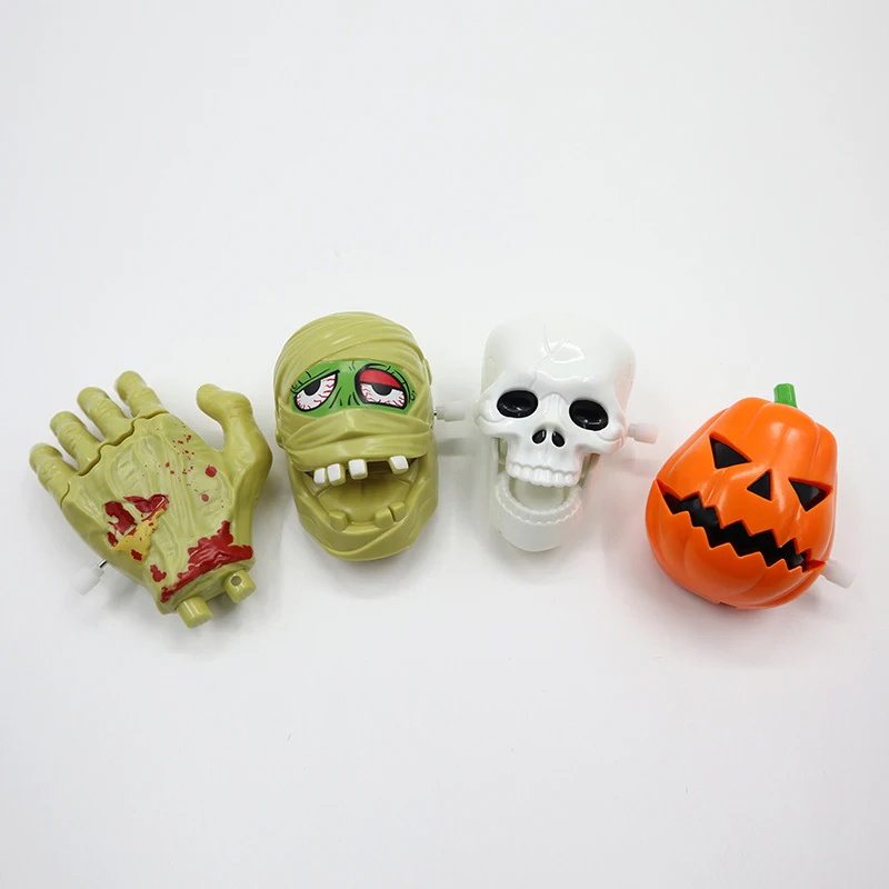 Juguetes de broma divertidos para fiesta, tira de pelo de Calavera, cadena de mano de fantasma, cabeza de calabaza, juguete de momia de relojería divertido para Halloween