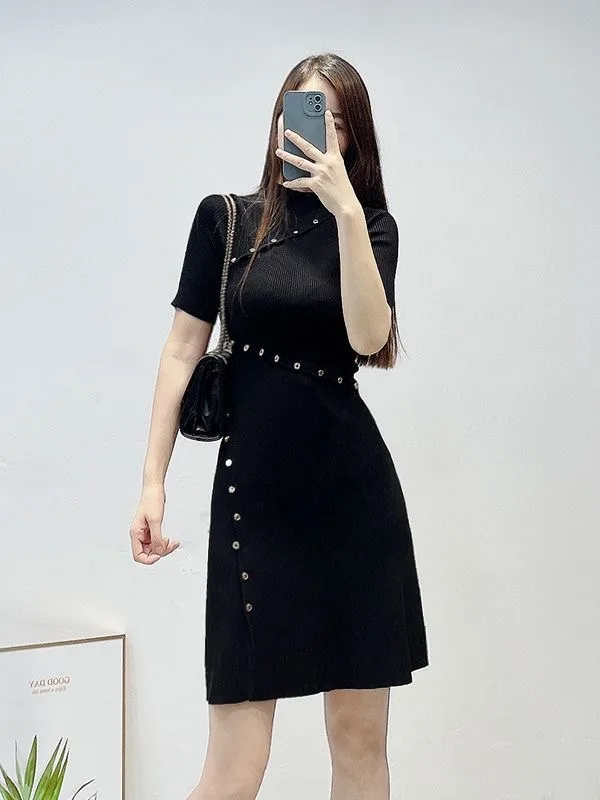 New French style commuting black ribbed short sleeved dress with waist cinching buckle and short sleeved knitted dress