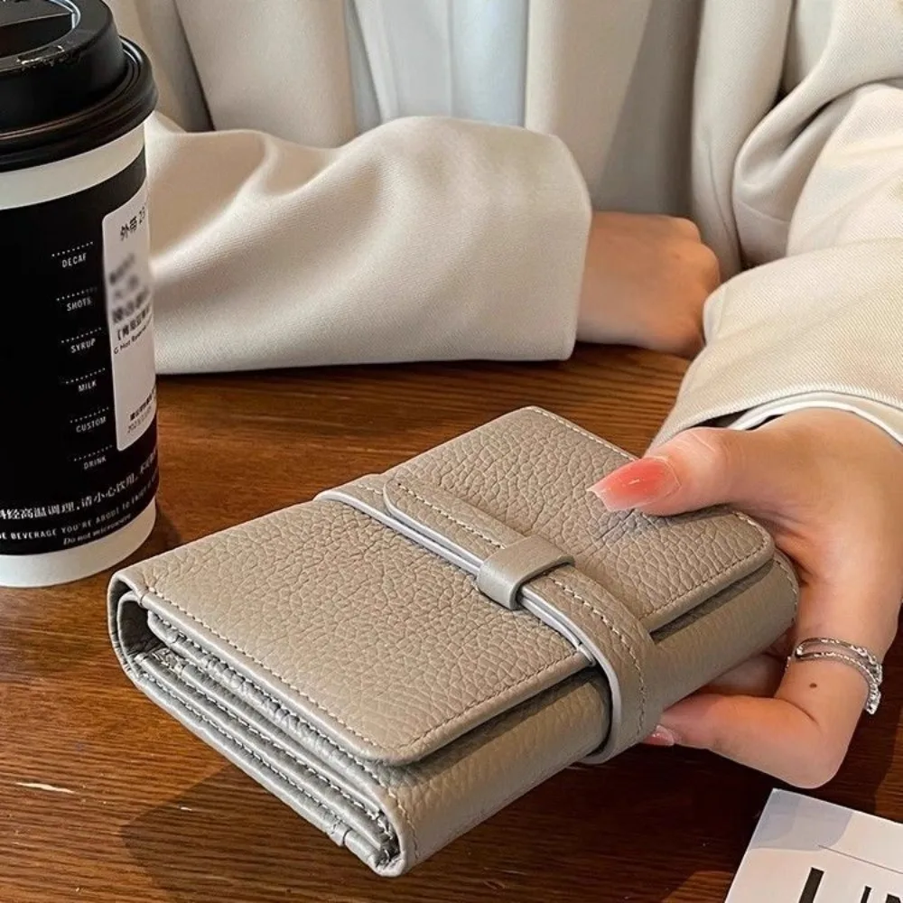 Ins Simple Wallet Women's Short 2026 New Large-capacity Multi-card Position Light Luxury Leather Strap Wallet Vertical Model~