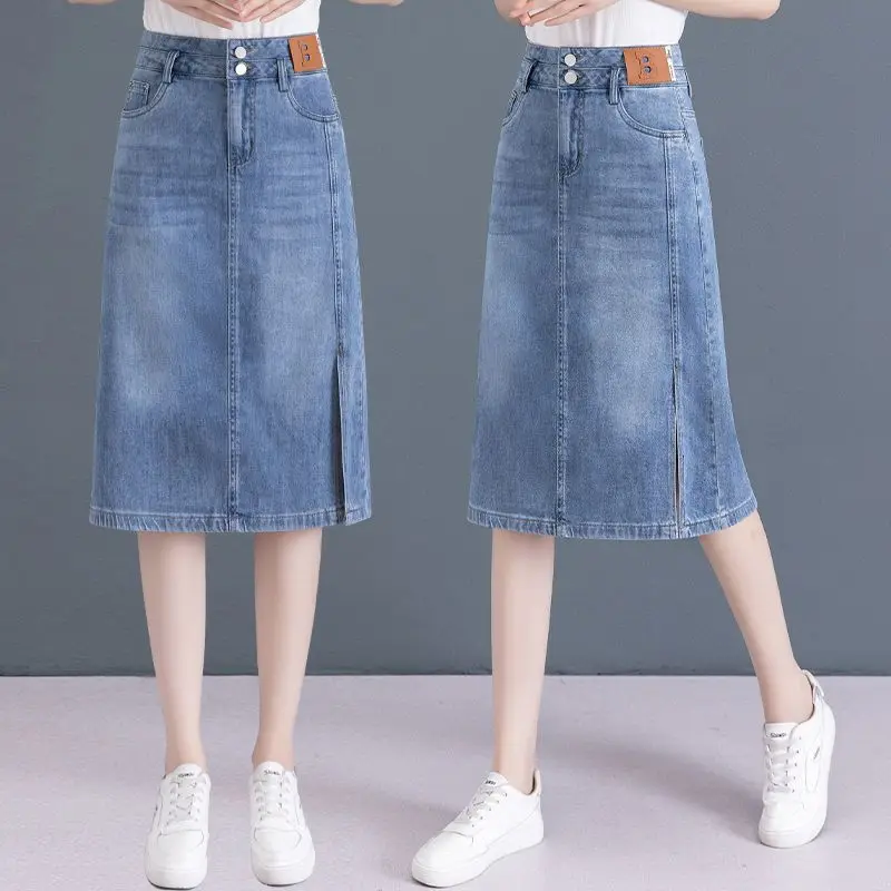 Jupes en denim taille haute pour femmes, poches boutonnées, ligne A, mince, midi, hanche fendue, enveloppé, document solide, minimaliste, trajet domicile-travail, été, nouveau, 2024