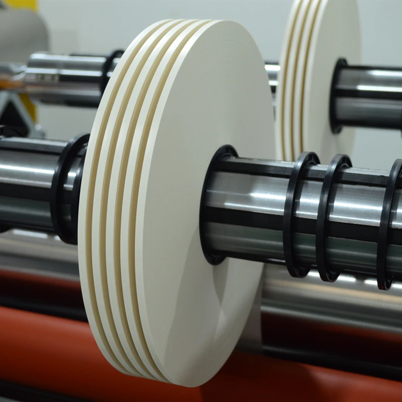 Riavvolgitrice per taglio carta isolante con condensatore per avvolgimento superficiale