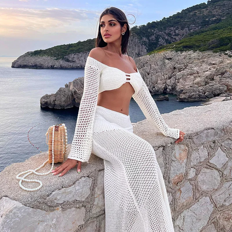 Conjunto de dos piezas de punto blanco para mujer, traje de playa Sexy transparente de ganchillo, conjuntos de falda y Top de manga larga 2024