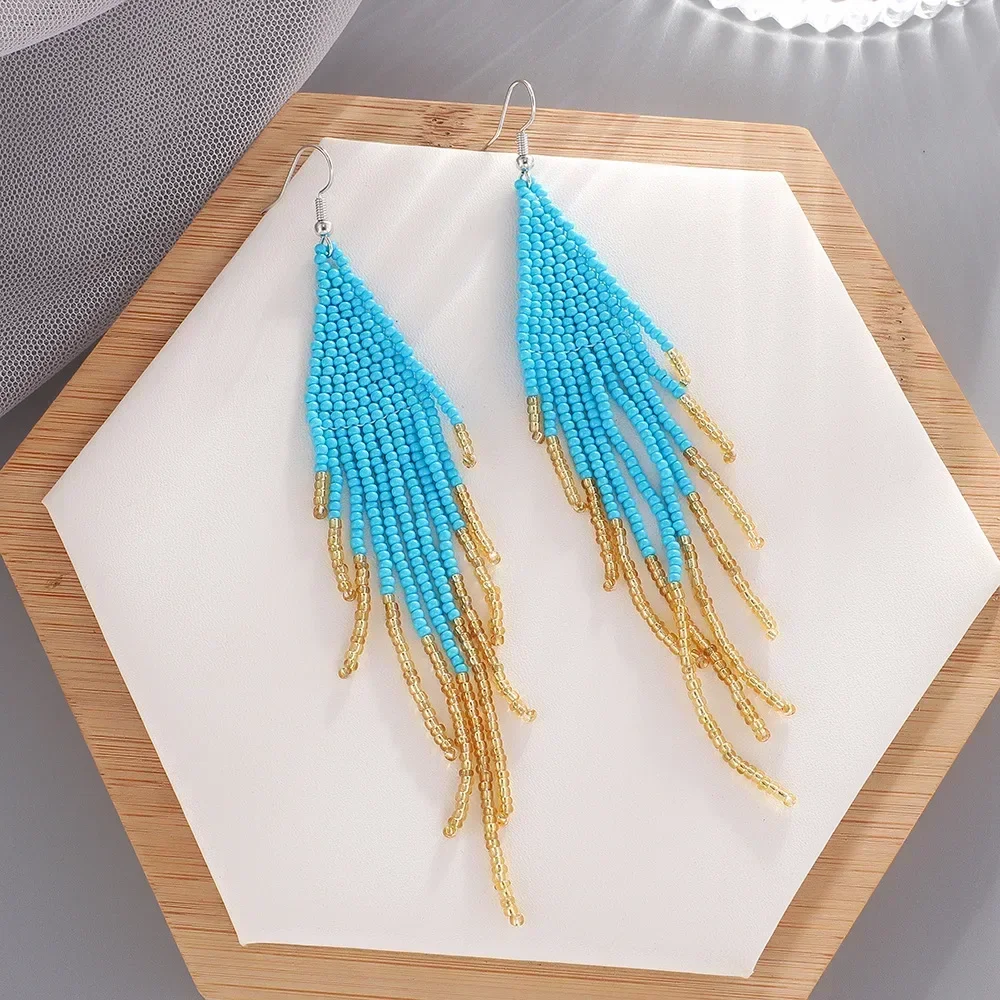 

2025 Rice Bead Earrings Beaded Hand Knitting Personality Retro Rice Pearl Bohemia Geometry Ma'am Long Tassel Earrings For Women
