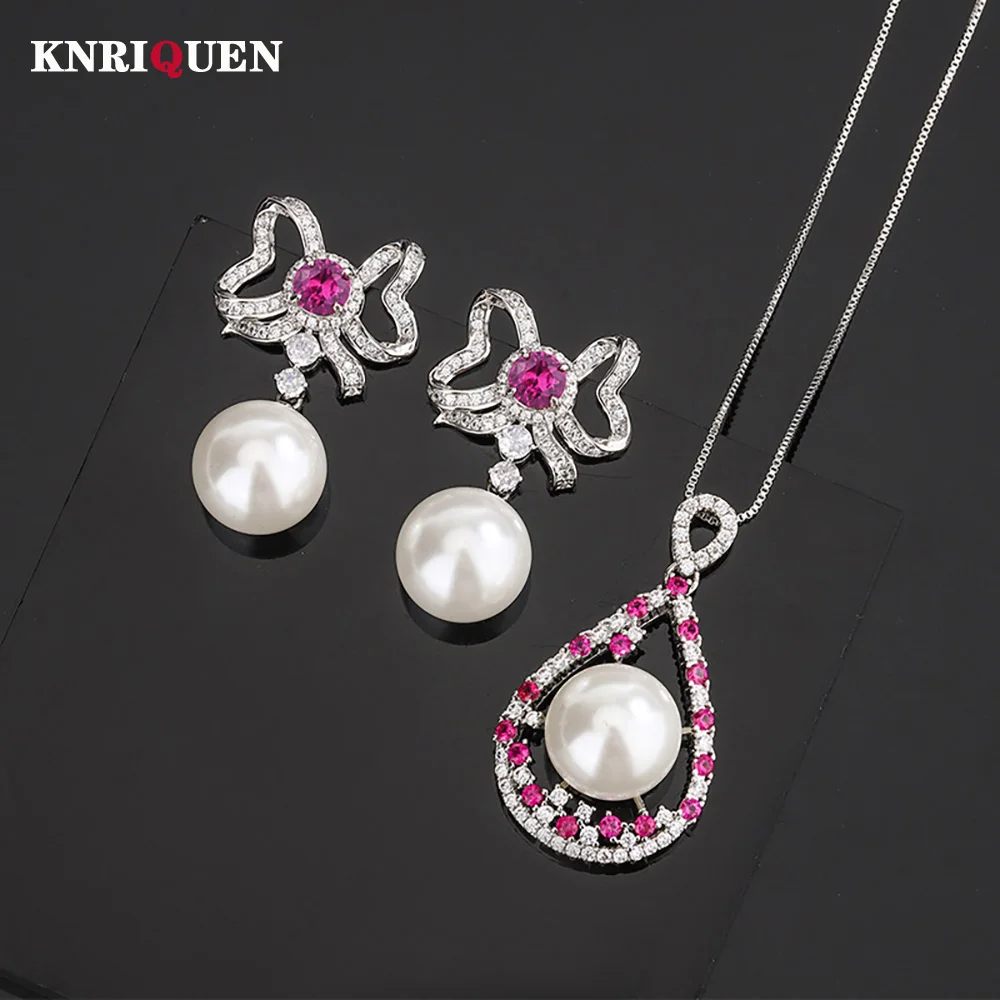 

Charms 14mm White Pearl Ruby Pendant Necklace Bowknot Drop Earrings for Women Lab Diamond Anniversary Wedding Party Jewelry Sets