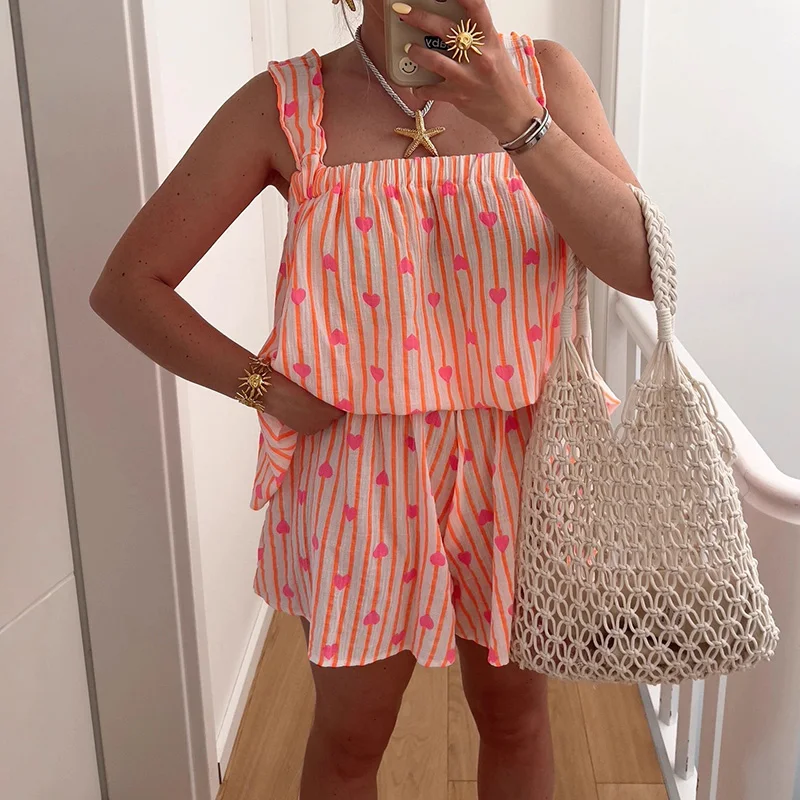 

Элегантная домашняя одежда, свободные пижамные комплекты, сексуальные топы на бретельках с открытыми плечами и короткие брючные костюмы, женские модные полые наряды из 2 предметов с принтом