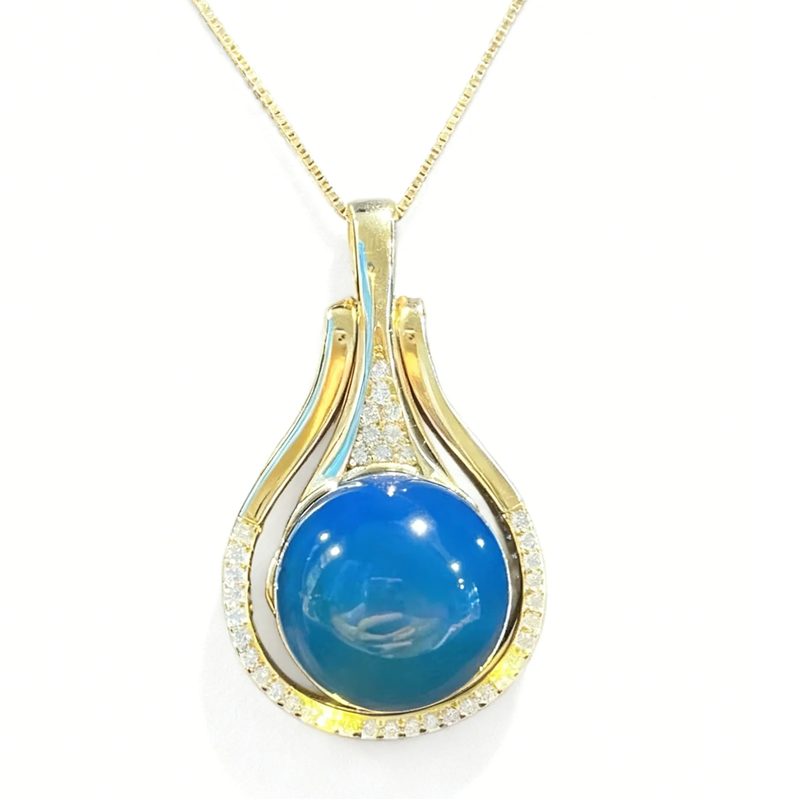 

Natural Mexican Blue Amber Pendant in Sterling Silver, 13mm Teardrop Dual Arc Frame Design, Elegant Jewelry for Daily Wear