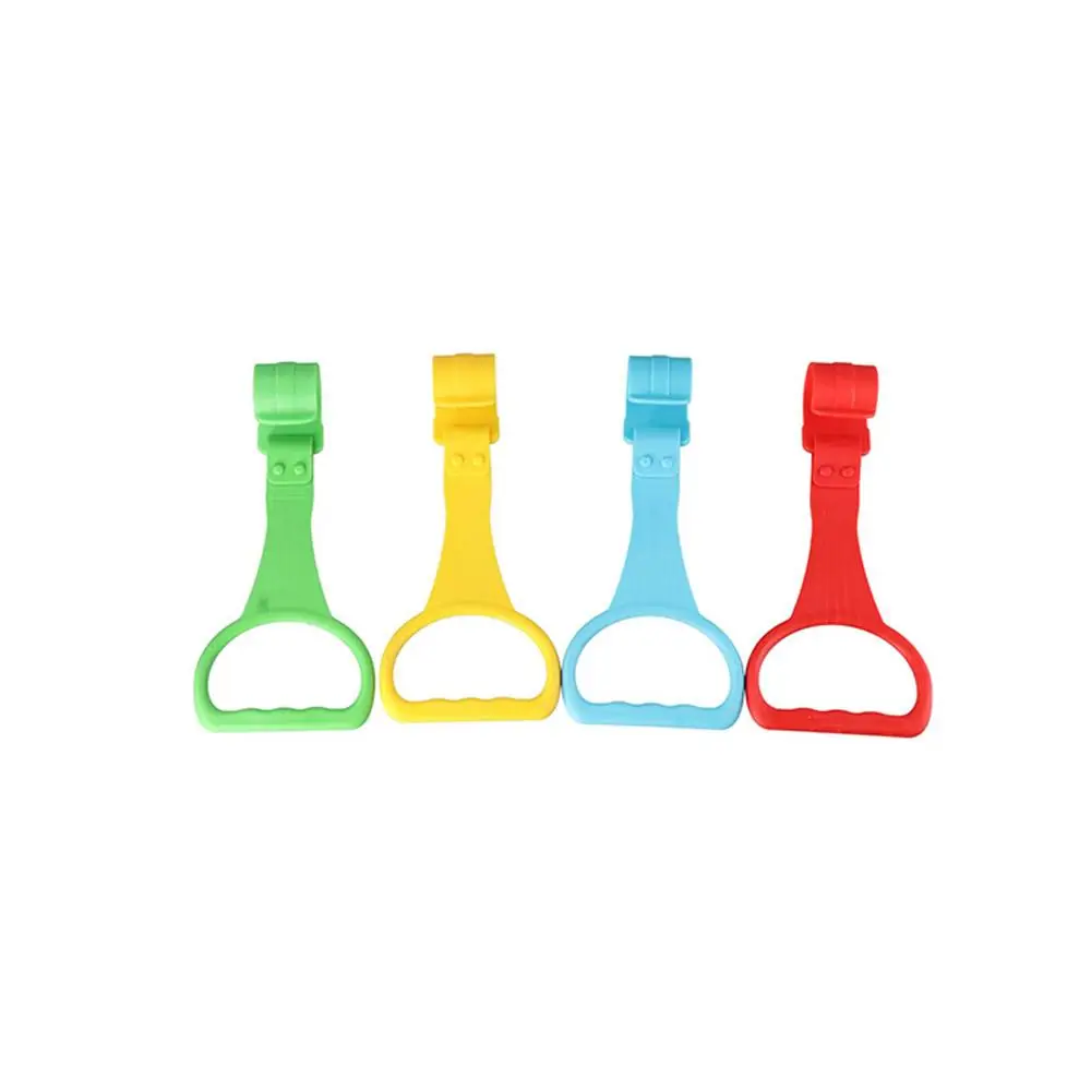 حلقة سحب بلاستيكية لطيفة لإكسسوارات سرير روضة الأطفال بلون واحد، حلقة سحب لعربة الأطفال، حلقة تعلم الوقوف