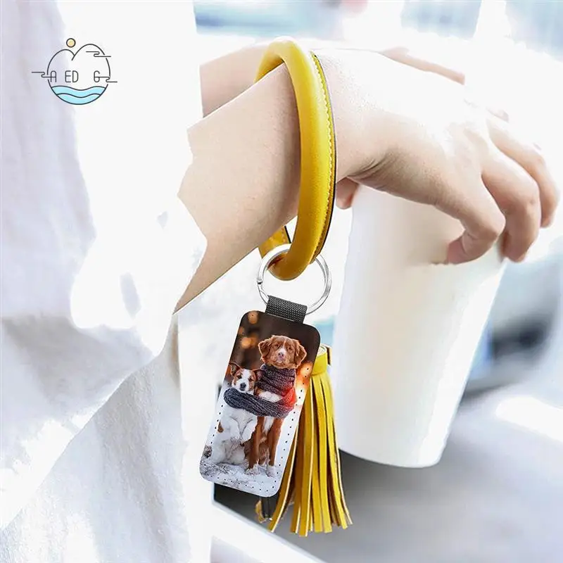 

AED6-20Pack Блестящий брелок из искусственной кожи с теплопередачей, двухсторонний сублимационный брелок