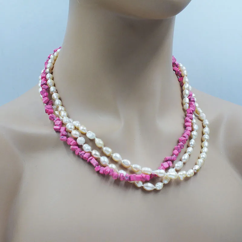 

Simple and versatile. 3 strands of natural freshwater pearl/semi-precious stone necklace 20”