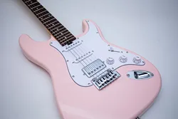 Factory Direct, Xylophone Figurines, Rosewood Fingerboard, Pink 6 String Electric Guitar. Orders can be shipped. Customizable.