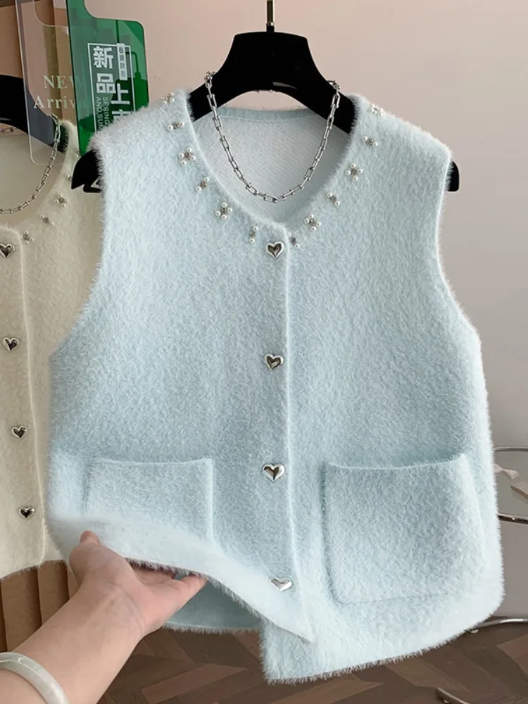 เสื้อกั๊กทรงกลมปักลายหนัก สำหรับฤดูใบไม้ร่วงและฤดูหนาว เนื้อผ้านุ่มสบาย แฟชั่นสำหรับผู้หญิง สไตล์ลำลอง สีมุกเรียบง่าย...