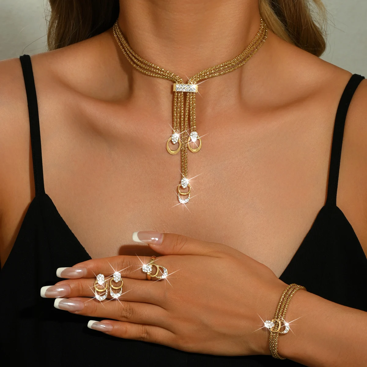 Cross border hot selling gold-plated exaggerated crystal jewelry set, creative bridal necklace, earrings, rings, four piece set