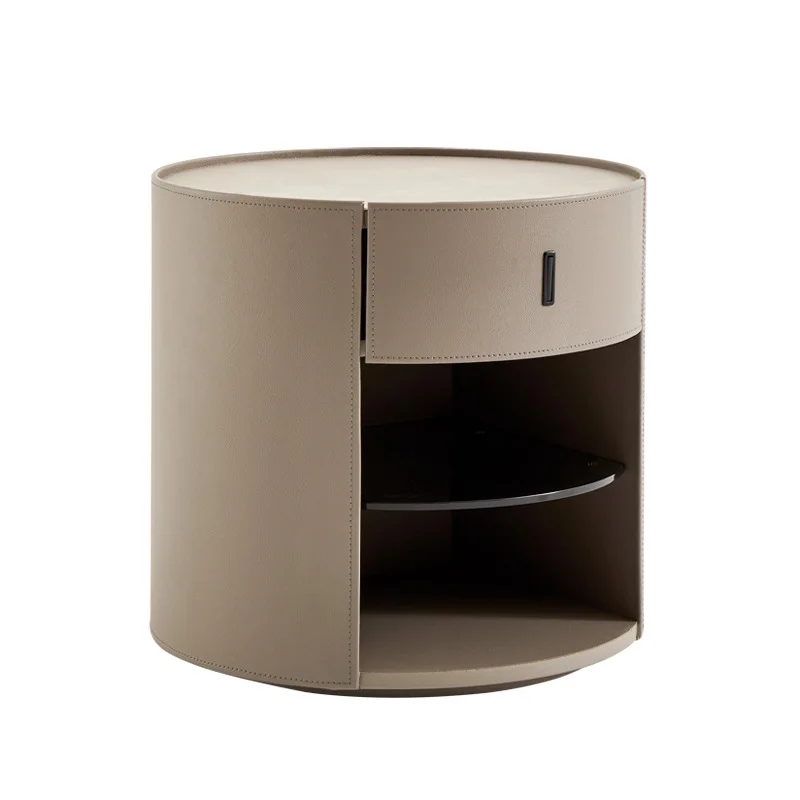 

Italian minimalist round saddle leather bedside table high-end designer bedroom bedside table