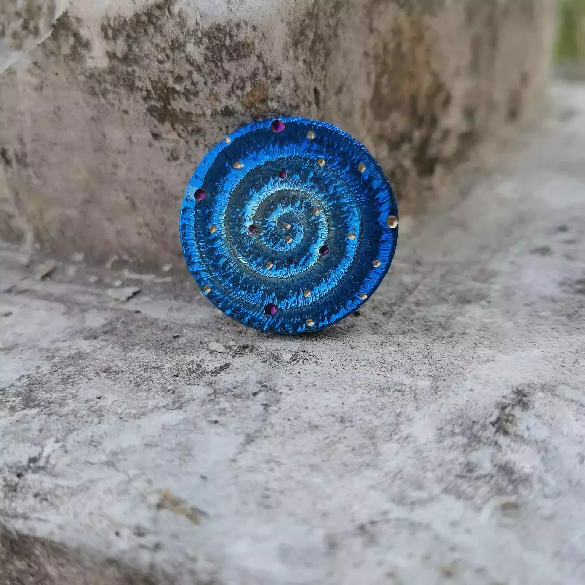 

Handmade titanium alloy coin pendant with hand carved baked color starry sky texture EDC