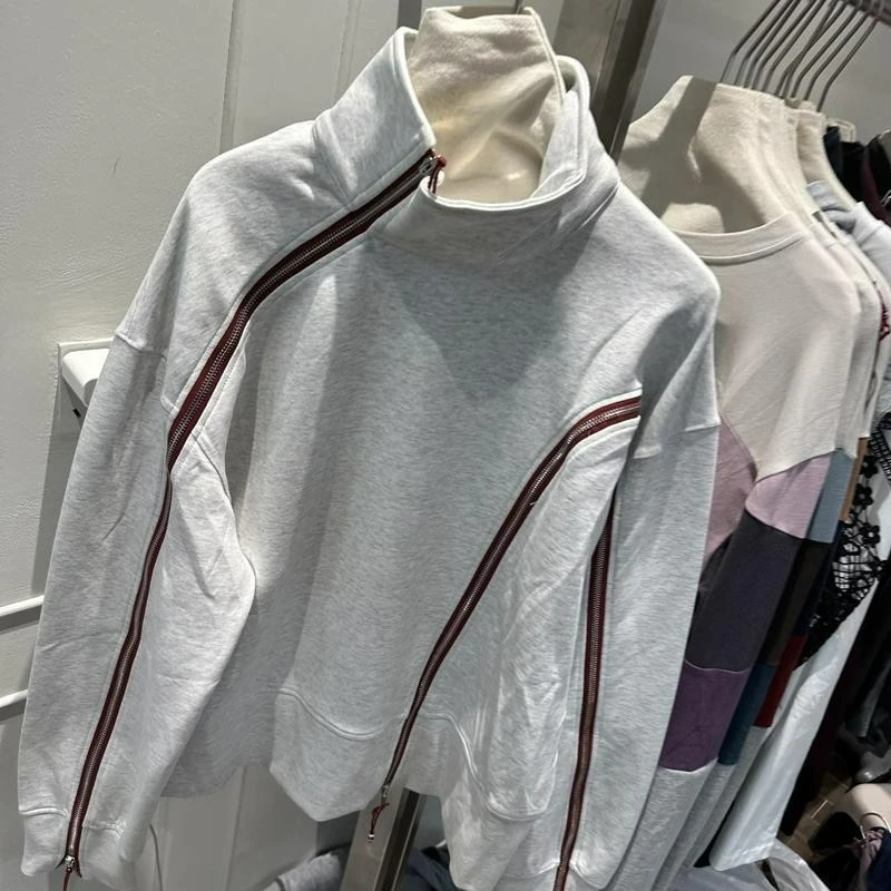 

Fashionable Korean Style Design with Irregular Zipper and Color Blocked Long Sleeved Hoodie for Casual Wear