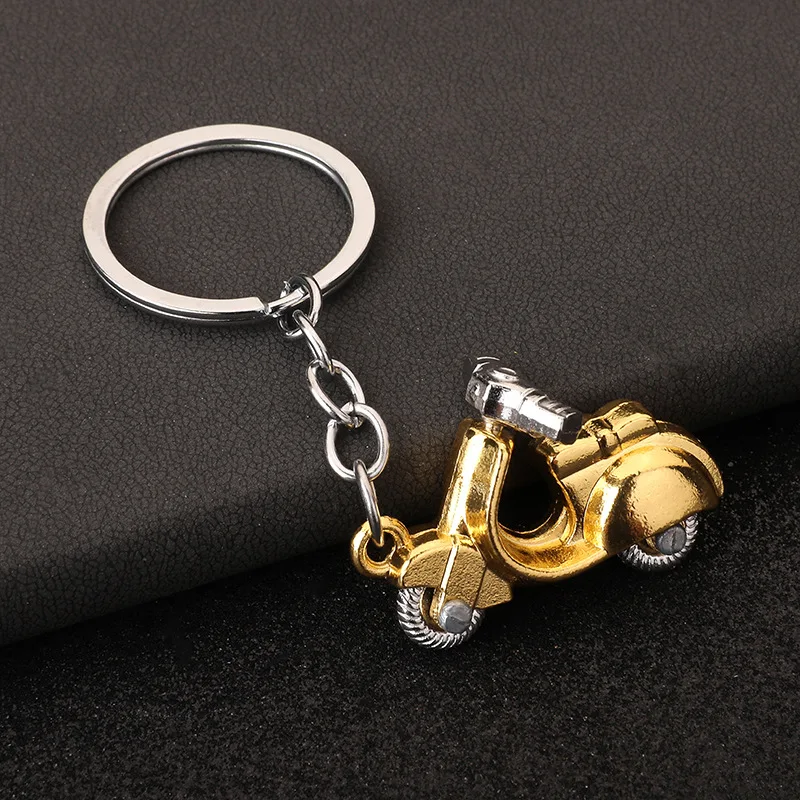 Punk keychain pendant pendant colorful Seiko products figure toy retro motorcycle direction wheels can be turned