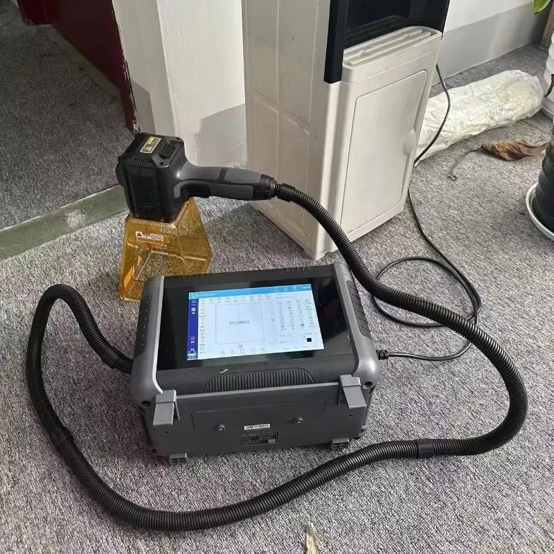 

Factory price20W 30W Handheld Fiber Marking Machine For Metal Rubber Tyre Tires Mini Marking Machine for sale