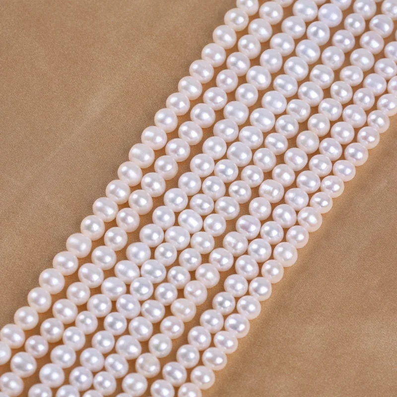 Hot Sale Natural Pearls Wholesale 7-8mm White Near Round  Potato Freshwater Pearl Strands