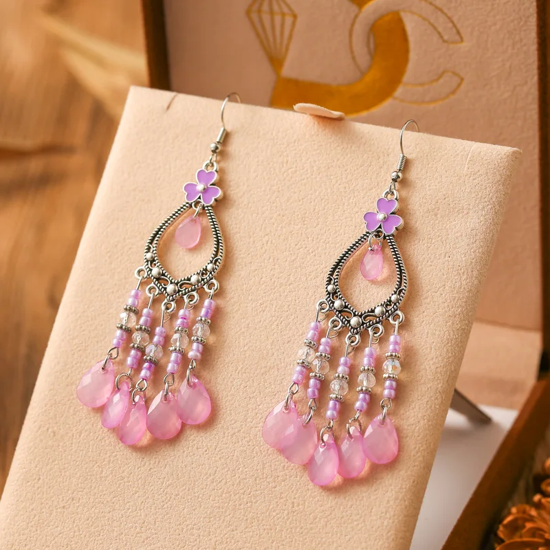 Boucles d'oreilles bohème ethnique goutte d'eau violette pour femme, boucle d'oreille plume, élégante, noble, goutte d'huile, perle de riz, fête, bijoux de mariage