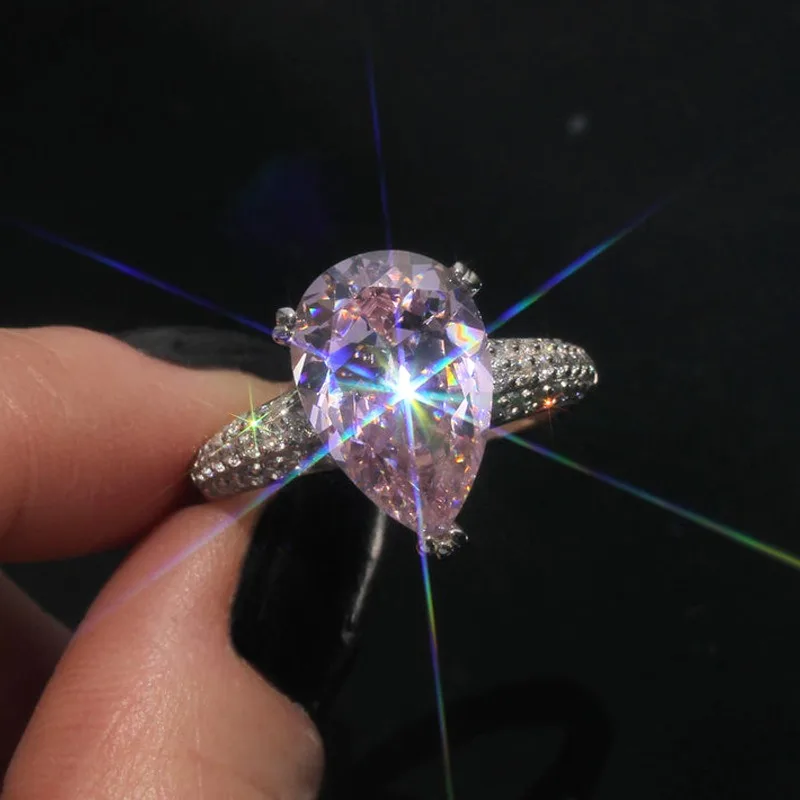 

European and American new fashionable water drop-shaped pink zircon inlaid light luxury personalized women's ring