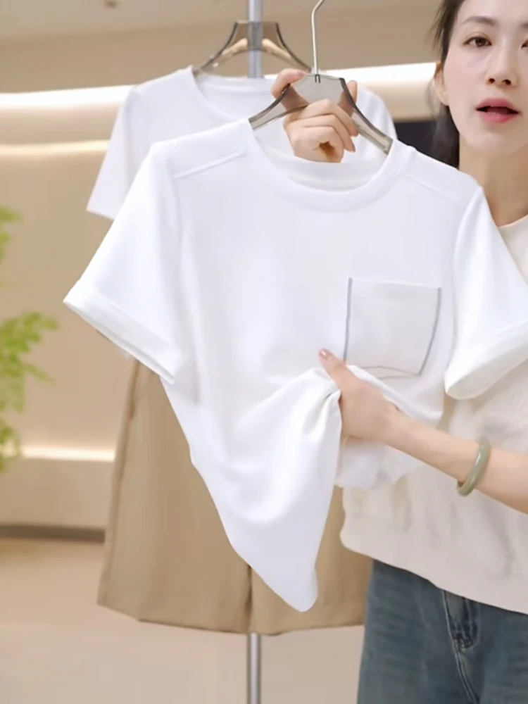 قميص صيفي جديد ناعم ومريح من القطن برقبة مستديرة وأكمام قصيرة مع تصميم جيب، قميص أساسي بأسلوب عملي على الطراز الكوري بقصة مست...
