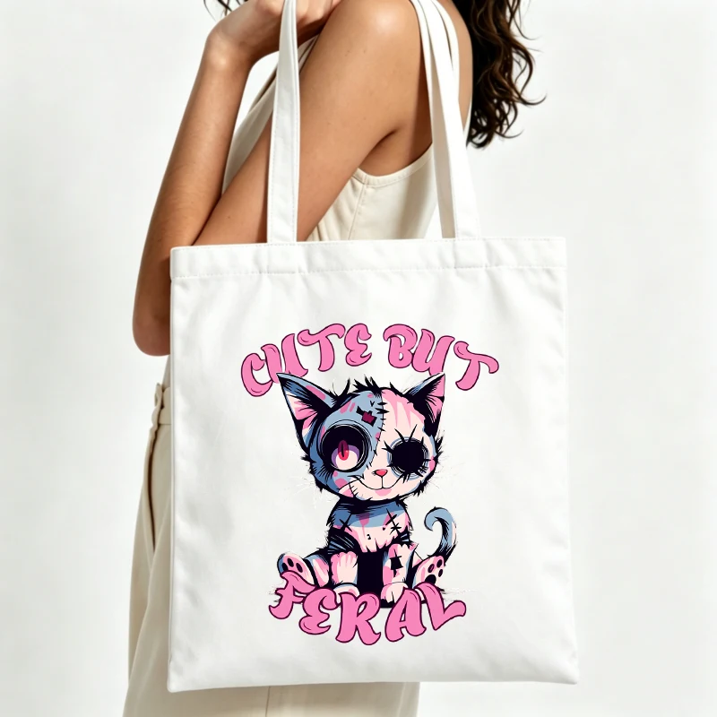 Women's cute cat graphic canvas tote bag with letter print, ideal for casual daily use and shopping outings