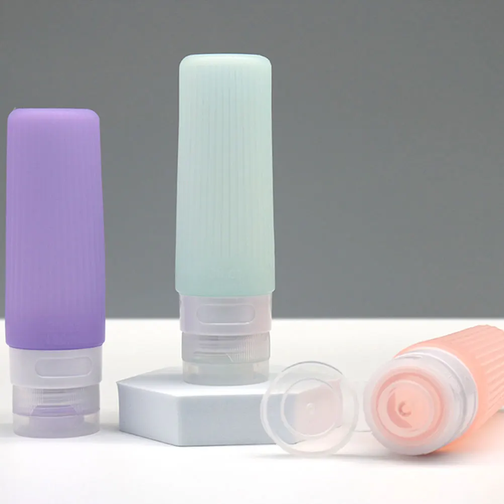 

4pcs Travel Accessories Shampoo Squeezing Bottles Portable Toiletries Containers Silicone Liquid Lotion Bottles For Camping
