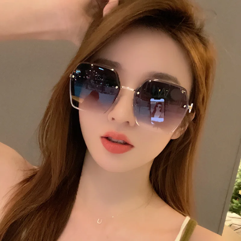 Women's Sunglasses High-Grade UV Protection2024New Summer Sun Protection Frameless to Make Big Face Thin-Looked Fashion Sunglass