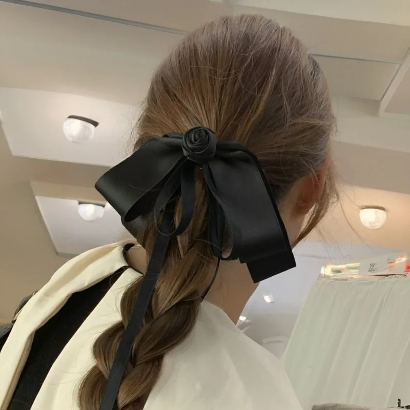 

Новинка 2026: Черная заколка-краб с бантом из камелии и струящейся лентой для прически-пучка, винтажный шик, аксессуар для женщин