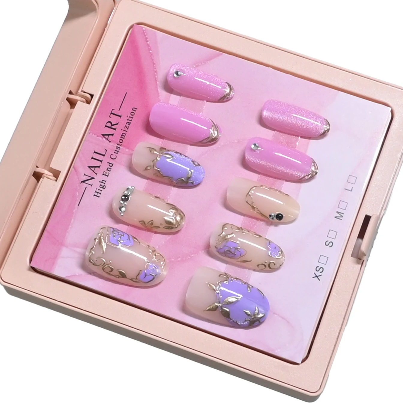 New arrival: 10 handmade medium almond press-on nails, exquisitely packaged. Nude pink-purple base with gilded roses, French lin