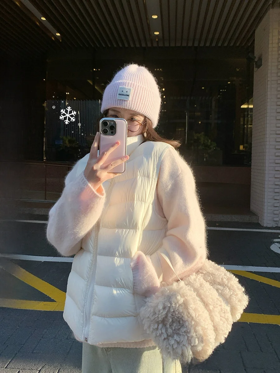 

CallmeEar Women's Thiened down Vest Winter Warm Outerwear Stand Collar Poly Fiber White Du down Inner Regular Length Pure...