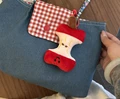 BLUE BAG AND APPLE
