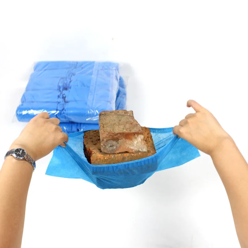 

Одноразовые бахилы из нетканого материала толщиной 3 грам, пылезащитные и противоскользящие бахилы, водонепроницаемые бахилы для дома и улицы