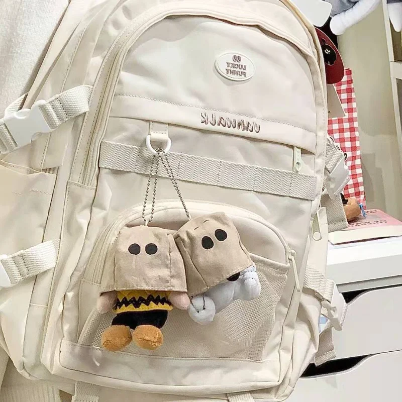 Poupée Snoopys de 10cm, modèle de chien de dessin animé, jouet en peluche, figurines d'anime, sac doux et mignon, pendentif de décoration, cadeau d'anniversaire pour filles et garçons