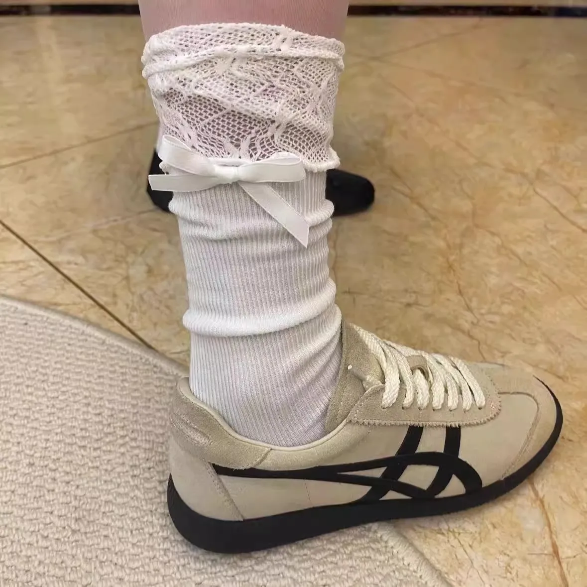 Splicing bow women's socks autumn new black and white lace calf mid leg socks